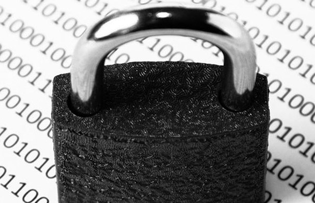 An image of a lock placed on top of a paper with binary code, representing the topic of a cyber security podcast. The lock signifies protection and security, while the binary code symbolizes the digital nature of cyber security and the importance of safeguarding information in the digital realm