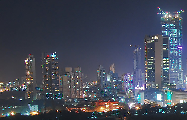 An image of a glowing cityscape at night.