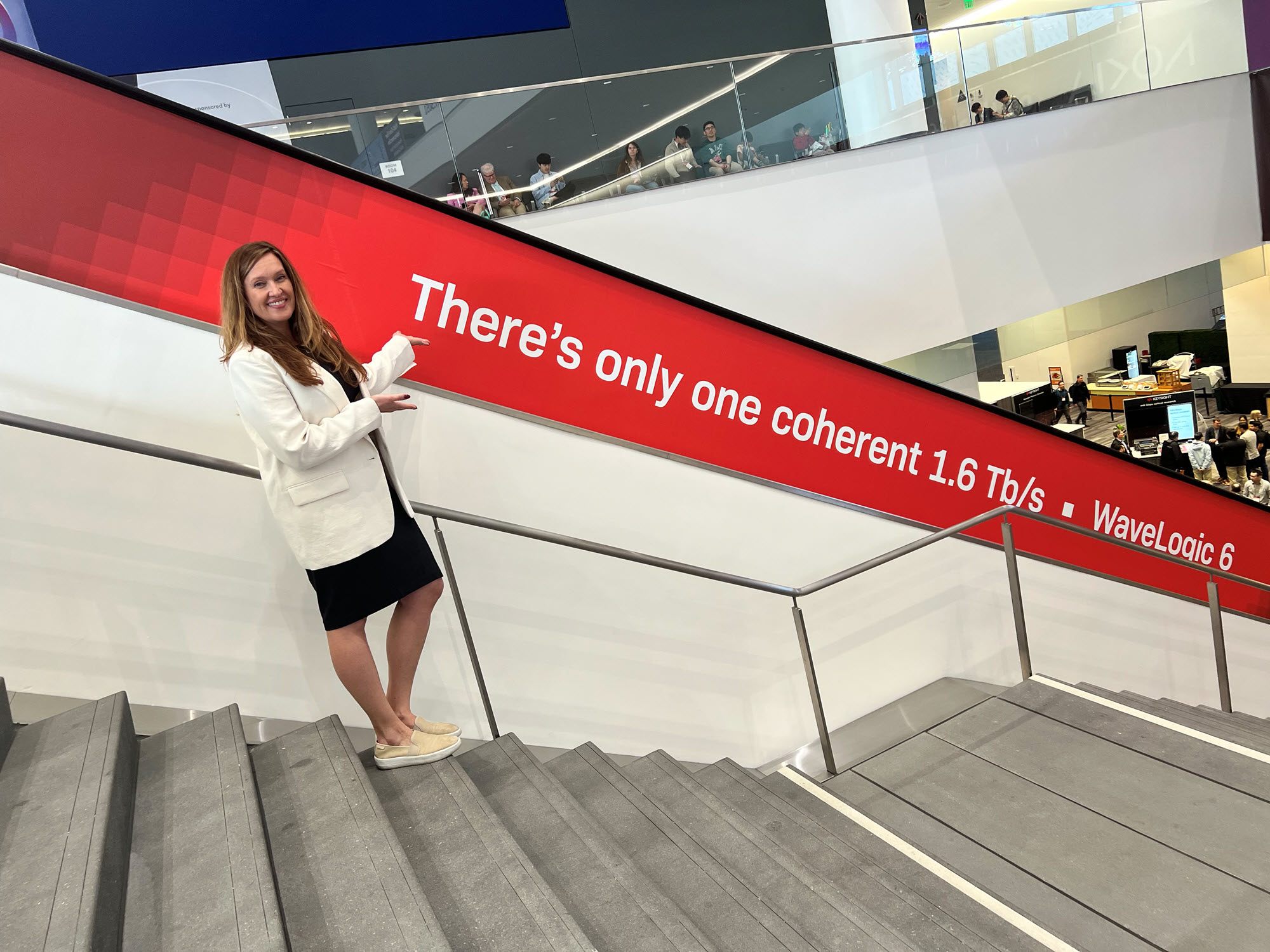 a woman standing on steps with the words